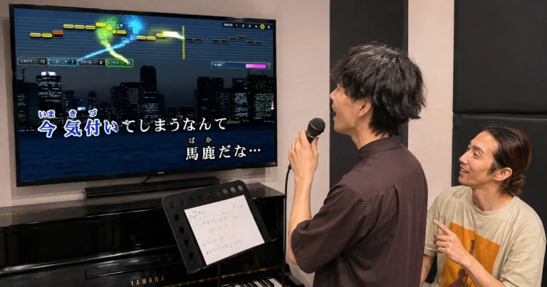 LIVE DAM Aiの採点画面を確認しながら歌を練習するSGMカラオケコースのイメージ